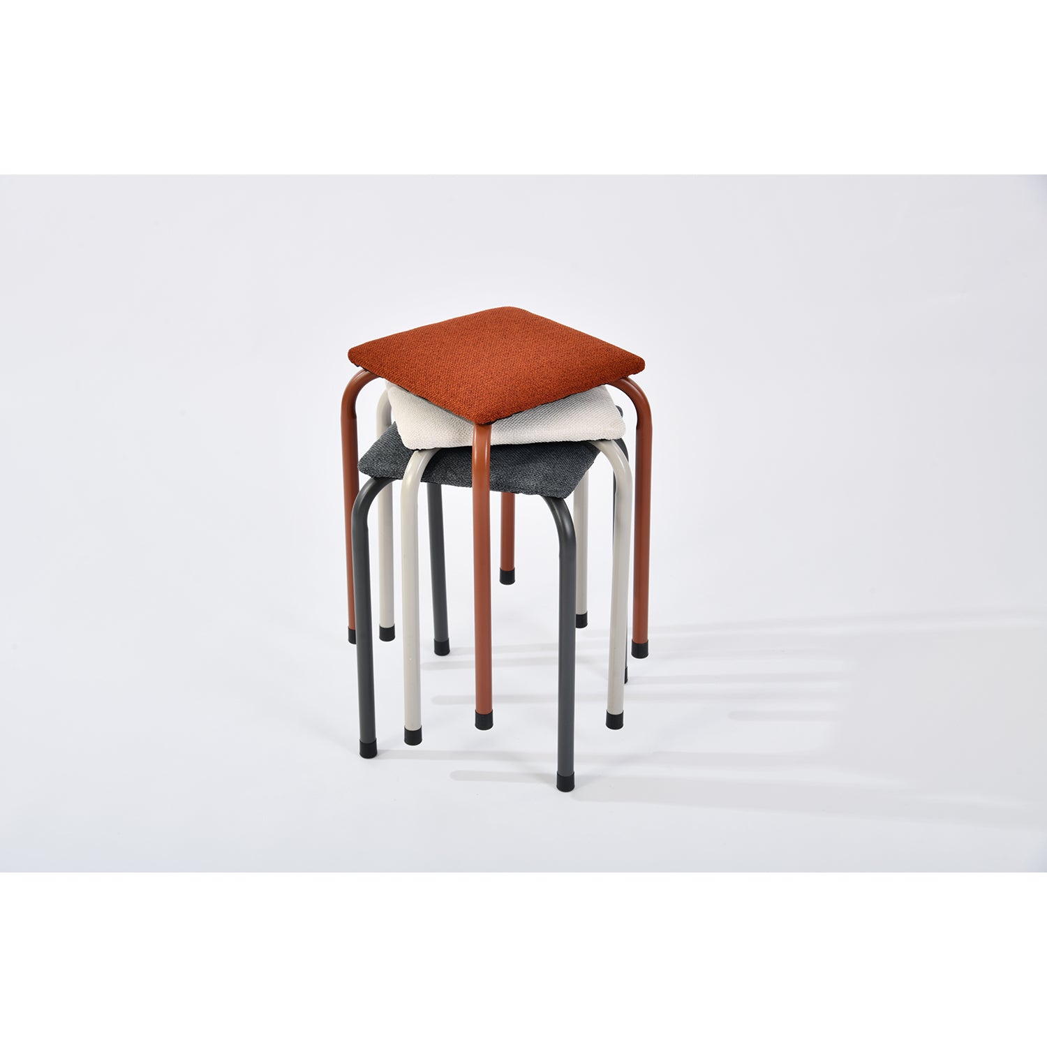 frey lumos brick - dark green stool - upholstered compact seating or footrest