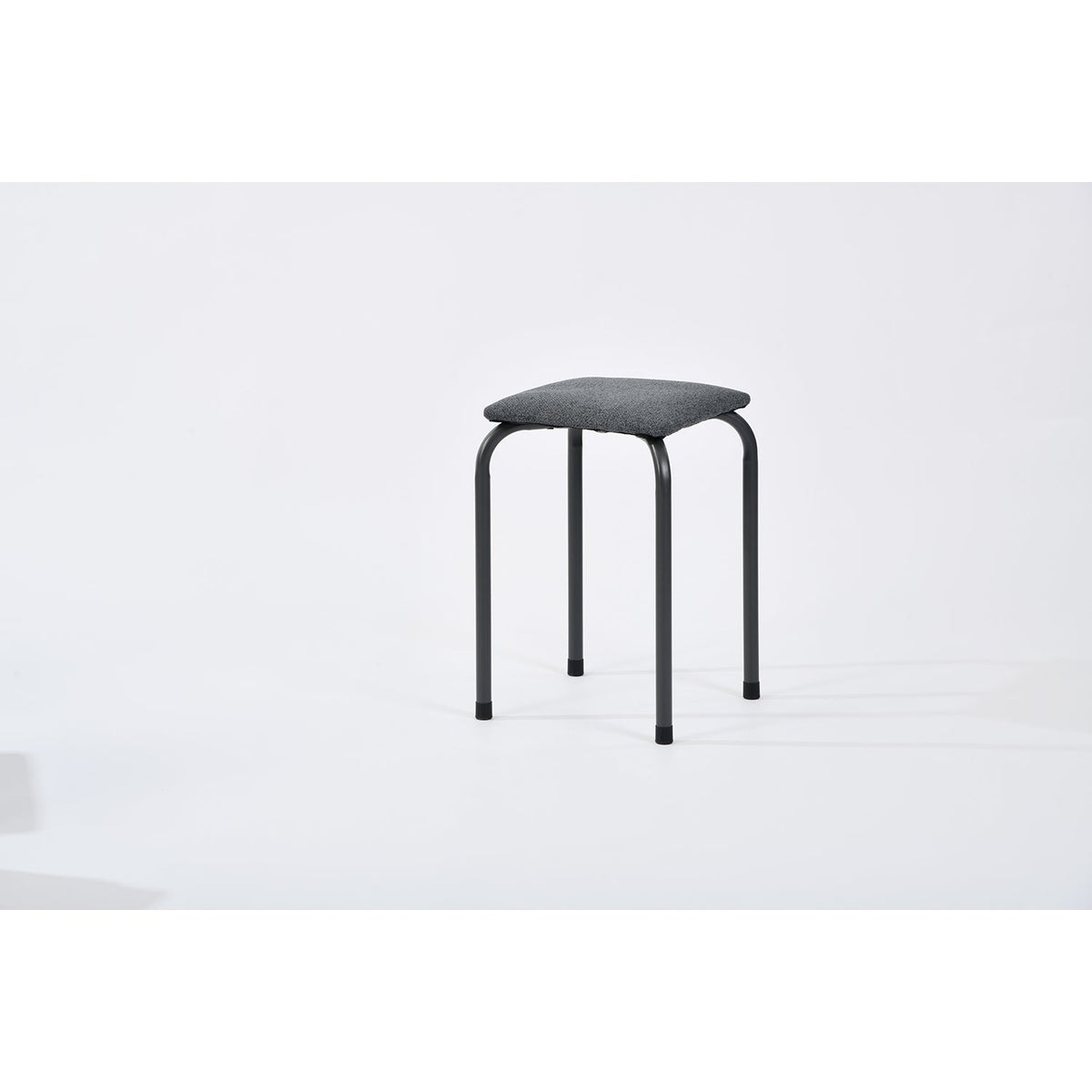 frey lumos grey - dark grey stool - upholstered compact seating or footrest